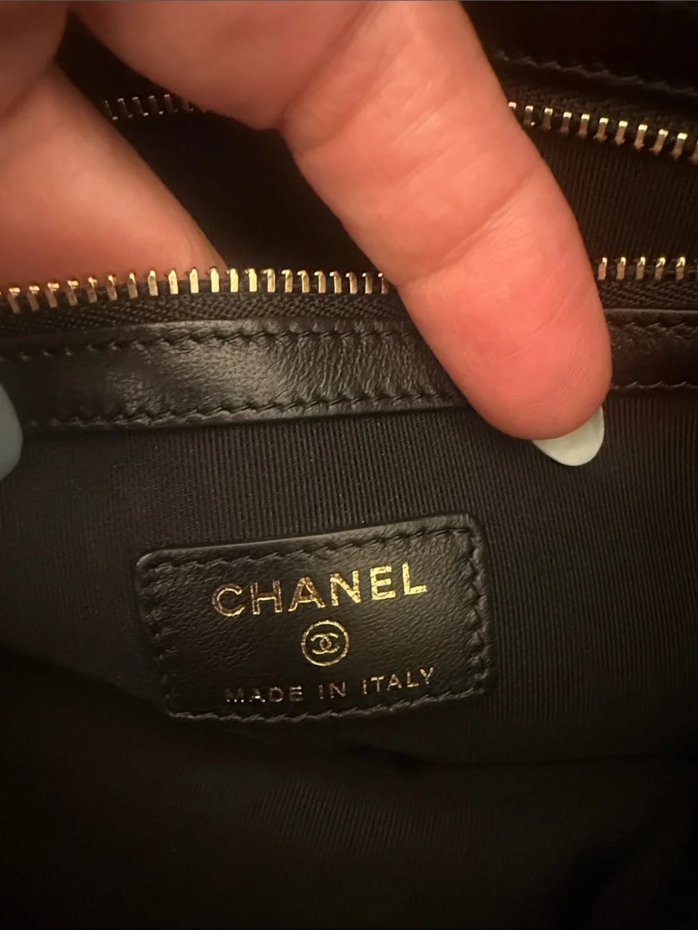 CHANEL Black Chevron Quilted Leather Zip Pouch with Gold CC